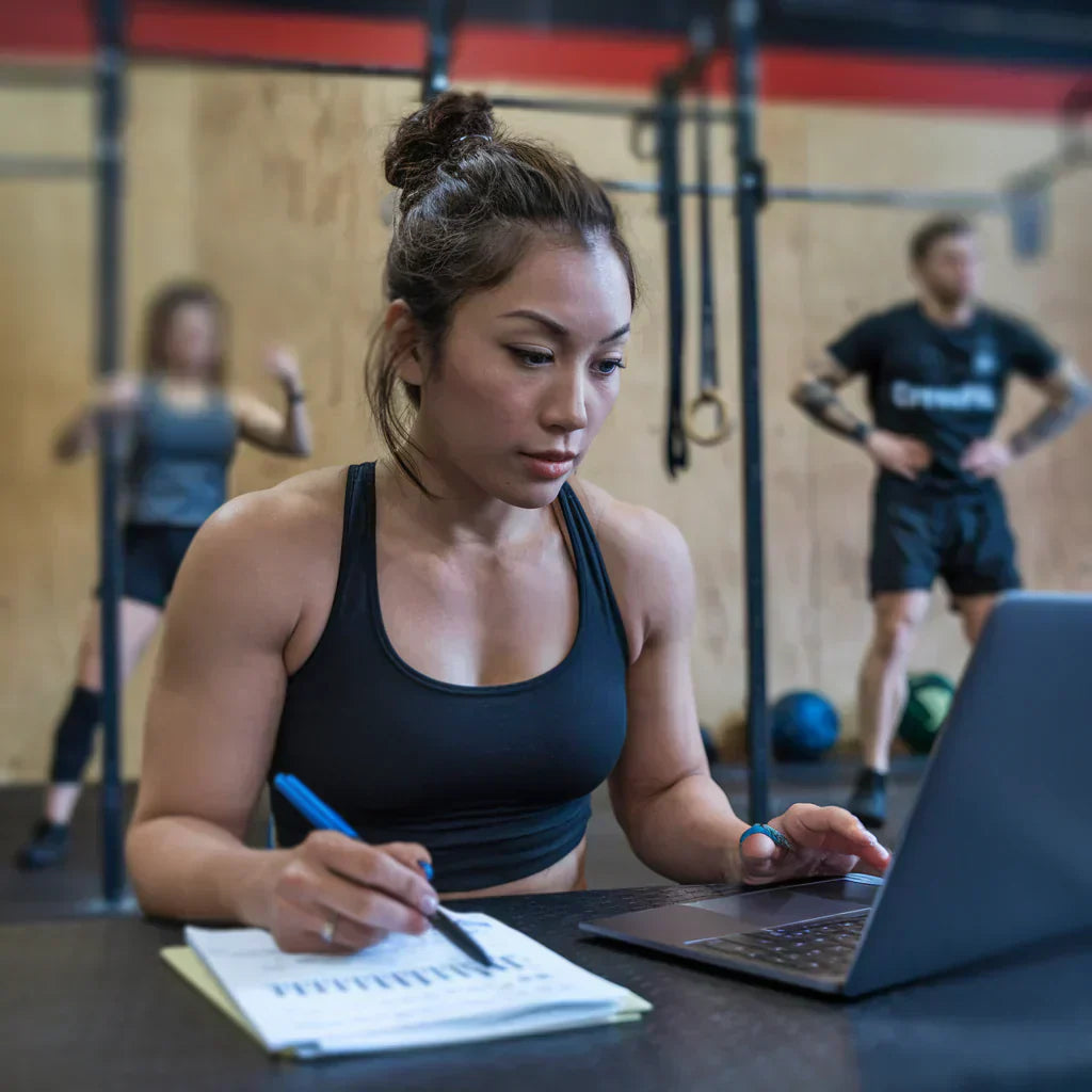 The girl is doing calculations.